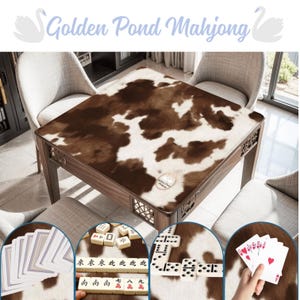 May include: A wooden Mahjong table with a brown and white cowhide pattern top. The table is surrounded by chairs. The image includes close-ups of Mahjong tiles, dominoes, and playing cards. The text "Golden Pond Mahjong" is at the top.