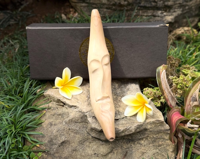 Tepi "Muka" carved from single wooden block of Cemara wood