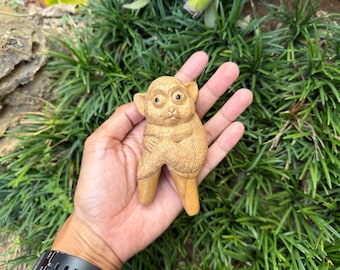 Kuripe "Tarsier" Carved from single wooden block high quality carving of Teak wood.