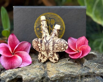 Kuripe Butterfly Handcrafted from Crocodile Wood with Balinese Burned Ornamentation