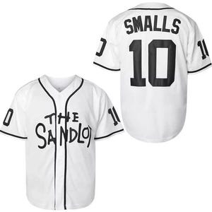 May include: White baseball jersey with black trim and lettering. The front of the jersey reads "THE SANDLOT" in a handwritten style. The back displays "SMALLS" above the number "10". The sleeves have the number "11" and "0".