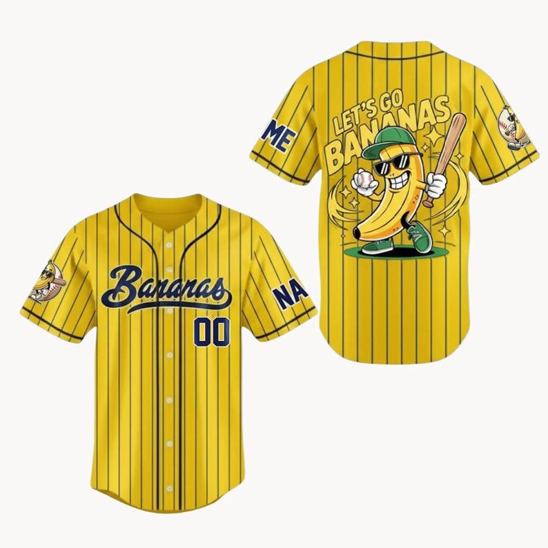 May include: Yellow baseball jersey with navy blue pinstripes and the word "Bananas" in navy blue script. The jersey has the number "00" in navy blue. The back of the jersey features a cartoon banana with sunglasses and a baseball bat.