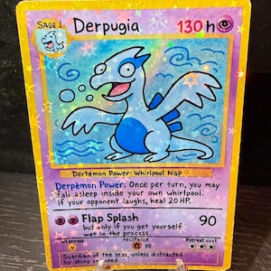 May include: A collectible trading card featuring a cartoonish blue and white creature named "Derpugia." The card has a holographic background with text describing the creature's abilities and attacks. The card is displayed on a clear stand.