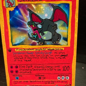 May include: A custom-made Derpizard trading card with a red and yellow border. The card features a cartoonish illustration of a black dragon-like creature with red wings and a long tongue. Text includes "Derpizard" and "Fire Spit".