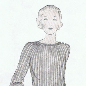 May include: A black and white striped sweater with a round neckline and long sleeves. The sweater has a black belt around the waist. The text "VOGUE'S 2nd BOOK OF KNITTING AND CROCHET" is at the top of the image.