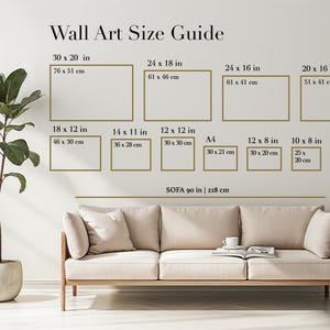 May include: A wall art size guide with dimensions in inches and centimeters. The guide includes sizes such as 30 x 20 in (76 x 51 cm), 24 x 18 in (61 x 46 cm), and smaller options. A sofa is shown below the guide, measuring 90 inches (228 cm).