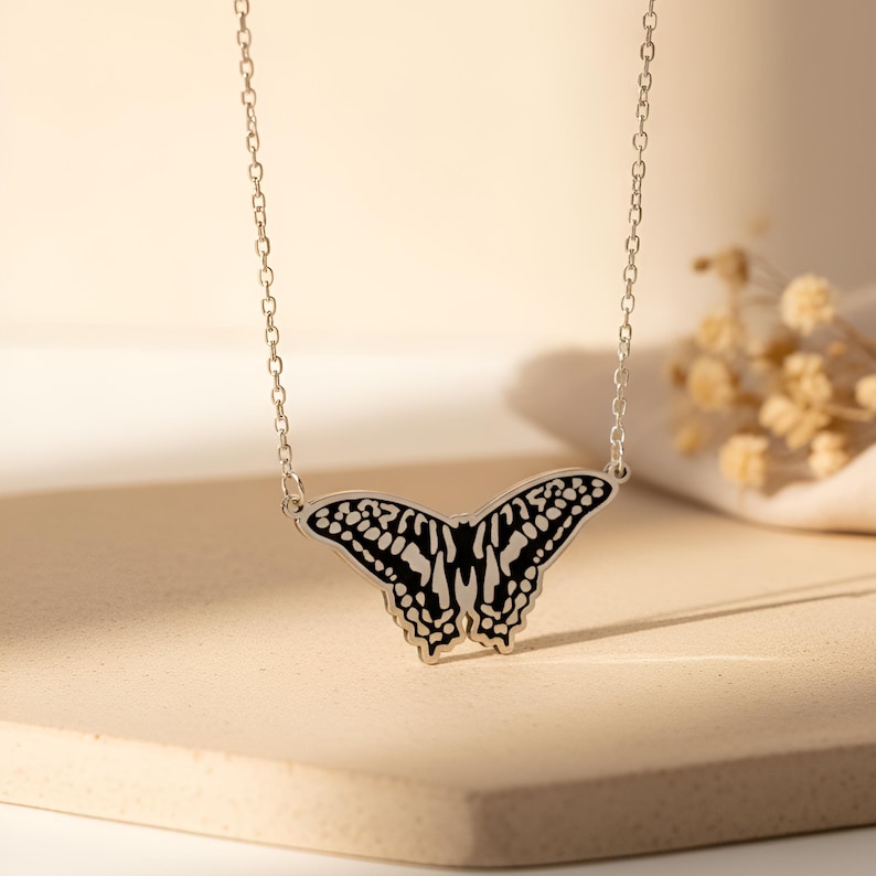 Handmade swallowtail butterfly necklace in 925 sterling silver, symbolizing transformation, freedom, and rebirth. Elegant nature-inspired pendant for women with detailed wing design and adjustable silver chain. Ideal symbolic gift for birthdays, anniversaries, and new beginnings.