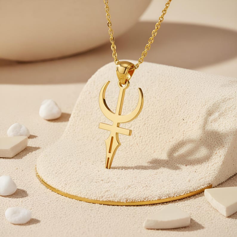 A handcrafted Feminine Energy Necklace made from 925 silver, featuring a sacred symbol pendant inspired by spiritual and divine feminine themes. The minimalist crescent and cross design hangs from a cable chain, offering a meaningful jewelry piece and a thoughtful gift for women who love symbolic and elegant accessories.
