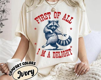 Comfort Colors® First Of All I’m A Delight Shirt, Funny Raccoon Graphic Tee, Sarcastic Animal T-Shirt, Trash Panda Shirt, Meme Tee