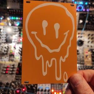 Yellow melting smiley eurorack blank 17hp