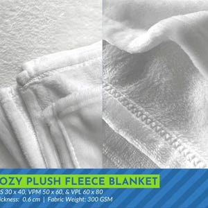 The image is a close-up of a cozy plush fleece blanket, showcasing its soft and fluffy texture.