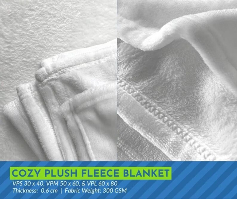 The image is a close-up of a cozy plush fleece blanket, showcasing its soft and fluffy texture.
