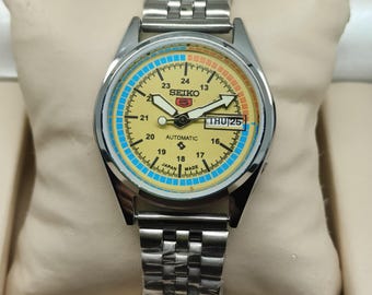 Reloj de pulsera automático vintage Seiko 5 para hombre, día y fecha, esfera amarilla, correa de acero inoxidable