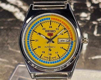 Reloj de pulsera automático vintage Seiko 5 para hombre, día y fecha, esfera amarilla, correa de acero inoxidable