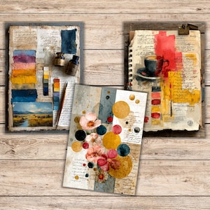 May include: Three pieces of art are displayed on a wooden surface. One is a journal with watercolour swatches and ink bottles. Another is a spiral-bound notebook with a coffee cup illustration. The third piece has floral and geometric designs.