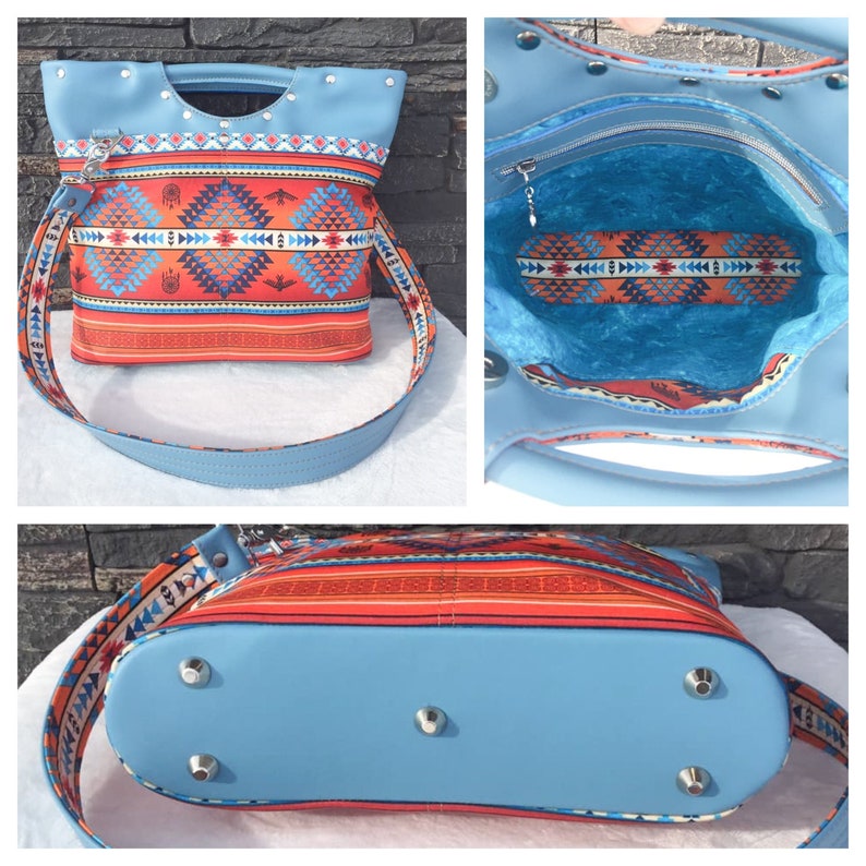 May include: A blue and red patterned tote bag with a top handle and a long shoulder strap. The bag has a zippered pocket on the inside and metal feet on the bottom.