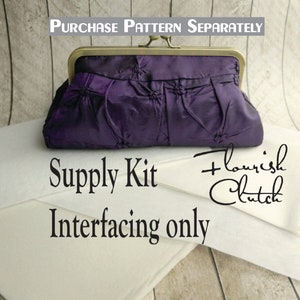 May include: A supply kit for a purple clutch purse. The kit includes interfacing only. The text "Flourish Clutch" is written in cursive on the image.