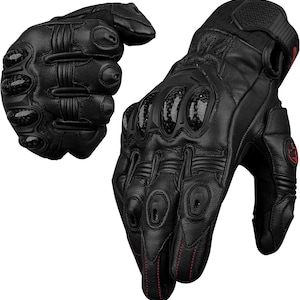 May include: Black motorcycle gloves with carbon fiber knuckle protection and red stitching. The gloves have a textured grip on the palm and fingers. The gloves are made of leather and have a secure wrist closure.