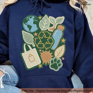 May include: Navy blue hoodie featuring a colorful graphic of environmental symbols. The design includes a globe, leaves, a recycling symbol, a water bottle, a tote bag, a sun, and a paw print. The text at the bottom reads "PNG File - Digital Download Only (No Physical Item)".