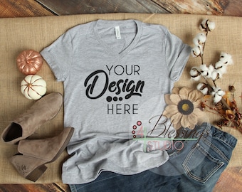 Download Free Fall Flat Lay Mockup Bella Canvas 3005 Heather Athletic Gray V-Neck T-shirt Mock Up Styled Flat Lay Ladies Tee Vinyl Shirt Thanksgiving PSD Template