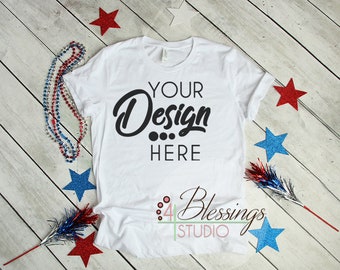 Download Free 4th of July Mockup Bella Canvas 3001 Mock-up Unisex T Shirt Mockup Blank Tee Photo White Patriotic Outfit Background Flat Lay Mockup PSD Template