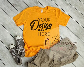 Gold T Shirt Bella Canvas Mockup 3001 Gold Unisex Shirt Gold T Shirt Flat Shirt Mockup Shirt Flat Lay Mens Shirt Mockup Printful Mockup 150 Free Book And Logo Mockups For Graphic Designers