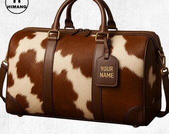 May include: A brown and white cowhide duffel bag with brown leather accents, handles, and a shoulder strap. The bag features a luggage tag with the text "YOUR NAME" in gold lettering. The bag has a zipper closure and gold-colored hardware.