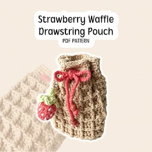 May include: A beige crochet drawstring pouch with a waffle stitch pattern. The pouch has a pink drawstring and a strawberry charm. The text "Strawberry Waffle Drawstring Pouch PDF Pattern" is at the top.