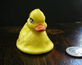 small ceramic duck bright yellow