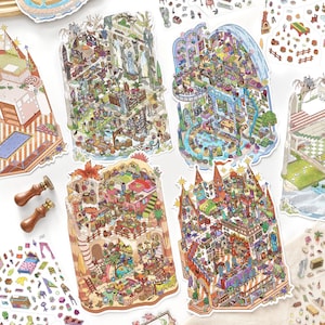 May include: A collection of die-cut stickers featuring intricate, multi-level isometric room illustrations with vibrant colours, alongside two wooden-handled wax seal stamps, showcasing detailed interior scenes with furniture, decor, and small objects.