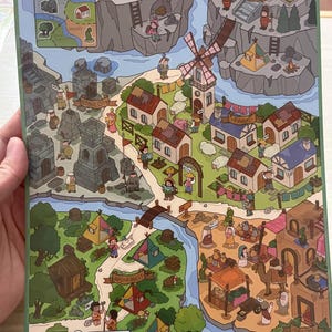 May include: A colorful illustrated map featuring various locations like a forest, castle, and desert. The map includes text labels such as "Valley", "Stone City", and "Rainforest". The artwork has a whimsical, cartoonish style with detailed illustrations of people and buildings.