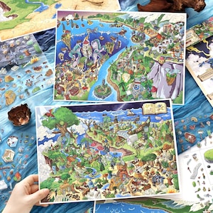 May include: Two detailed, colorful fantasy map prints with intricate illustrations of landscapes, buildings, and creatures. Additional sticker sheets with map elements are also visible, along with a wooden bowl.