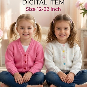 May include: A digital knitting pattern for a 12-22 inch size garment. The image displays two cardigans: one solid pink with matching buttons and one white with multicoloured flecks and buttons, both featuring long sleeves and ribbed trim.