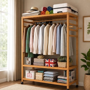 May include: A wooden clothes rack with multiple shelves and a hanging rail. The rack displays shirts, folded blankets, and decorative items. A suitcase and a straw hat are on the top shelf. The word "WALLACE" is displayed on a sign.