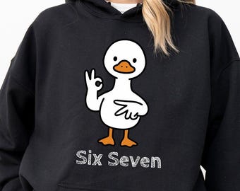 Cool Goose 6 7 Shirt, Funny Holiday Meme Tee, Trendy 67 Christmas Gift, Humorous 6-7 Outfit, Teacher Six Seven Sweater,67 T-shirt Sweatshirt