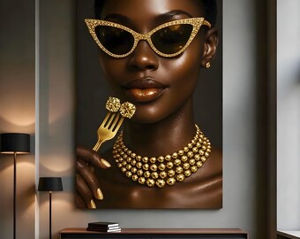May include: A portrait of a person wearing gold cat-eye sunglasses, a layered gold necklace, and holding a gold fork with two diamond-like objects. The person has gold nail polish and a gold lip color. The background is a dark gray.