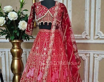 Lehenga de seda Kasturi bordada, conjunto nupcial de perlas hechas a mano.