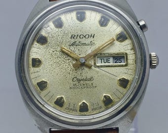 Reloj de hombre vintage Ricoh Crystal automático con fecha y día