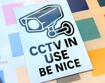 CCTV i bruk Var snäll vinyldekal - Säkerhetskameraklistermärke