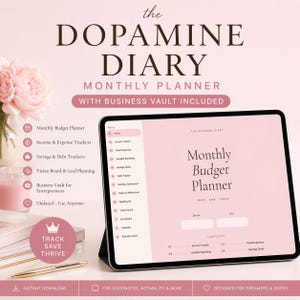 May include: A digital monthly planner titled "The Dopamine Diary" displayed on a tablet. The planner includes sections for budget planning, income and expense tracking, and vision board goals. The image features a pink and white color scheme with text that reads "Track, Save, Thrive."
