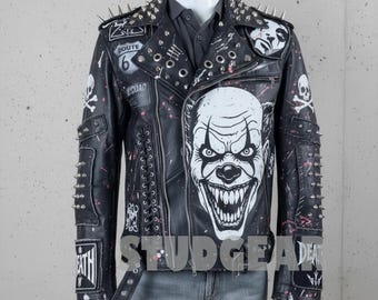 May include: Black leather jacket with silver spikes, patches, and a large white clown face graphic. The jacket features a Route 66 patch, skull and crossbones, and the word "DEATH".