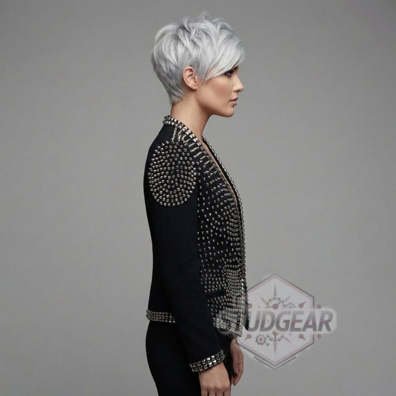 Side profile of studded leather jacket showing slim fit and arm detailing