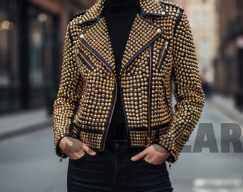 Women’s Gold Studded Biker Jacket Black leather moto jacket featuring thousands of golden round studs for a bold punk rock statement look