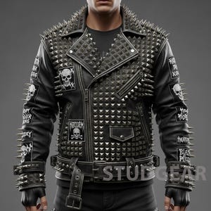 May include: Black leather jacket heavily studded with silver pyramid studs and long silver spikes. Patches with skull graphics and text are sewn on the jacket. The jacket has a belt with silver studs and the word "STUDGEAR" is printed on the bottom.