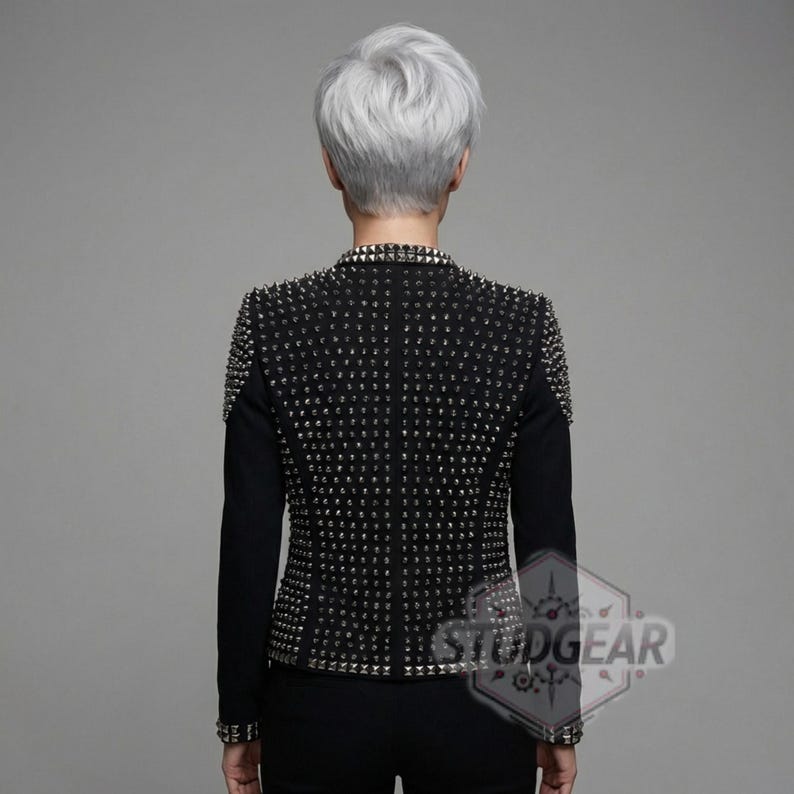 Edgy fashion blazer for women with heavy metal hardware on back and sleeves