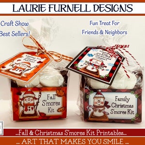 May include: Two printable gift tags for a fall and Christmas s'mores kit. The tags feature a snowman with a red and white hat and a red scarf. The text on the tags reads "Wishing You Smore Fall Fun!" and "Family Christmas S'mores Kit".