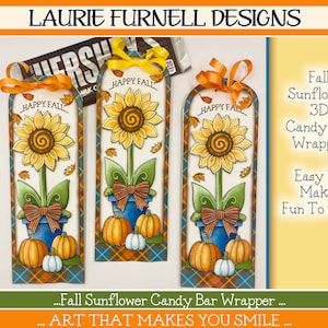 May include: Three printable designs for fall sunflower candy bar wrappers. Each design features a sunflower with a bow, a pot, and pumpkins. The text "Happy Fall" is on each design.