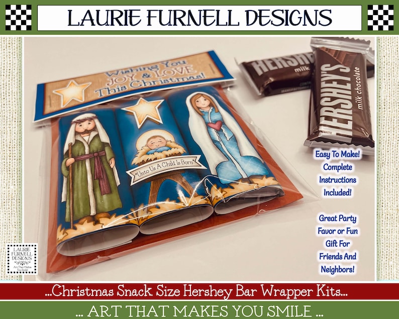 May include: A Christmas-themed craft kit for making Hershey's chocolate bar wrappers. The kit features a nativity scene with Mary, Joseph, and baby Jesus. The text on the kit reads "Wishing You Joy & Love This Christmas!" and "Unto Us A Child Is Born".
