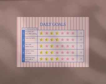 Op de afbeelding: Een roze en wit gestreepte Daily Goals-kaart met de titel "DAILY GOALS" in blauw. De kaart bevat secties voor dagelijkse taken zoals "Geen telefoon gedurende 1 uur na het ontwaken" en "Drink 2 liter water", met stervormige selectievakjes.