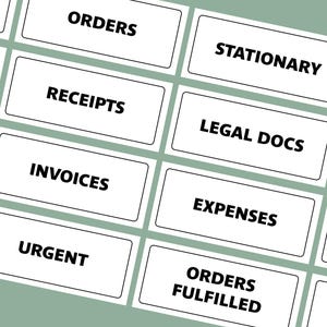 May include: White rectangular labels with black text, including "ORDERS," "RECEIPTS," "INVOICES," "URGENT," "STATIONARY," "LEGAL DOCS," "EXPENSES," and "ORDERS FULFILLED." The labels are arranged in a grid pattern on a light green background.